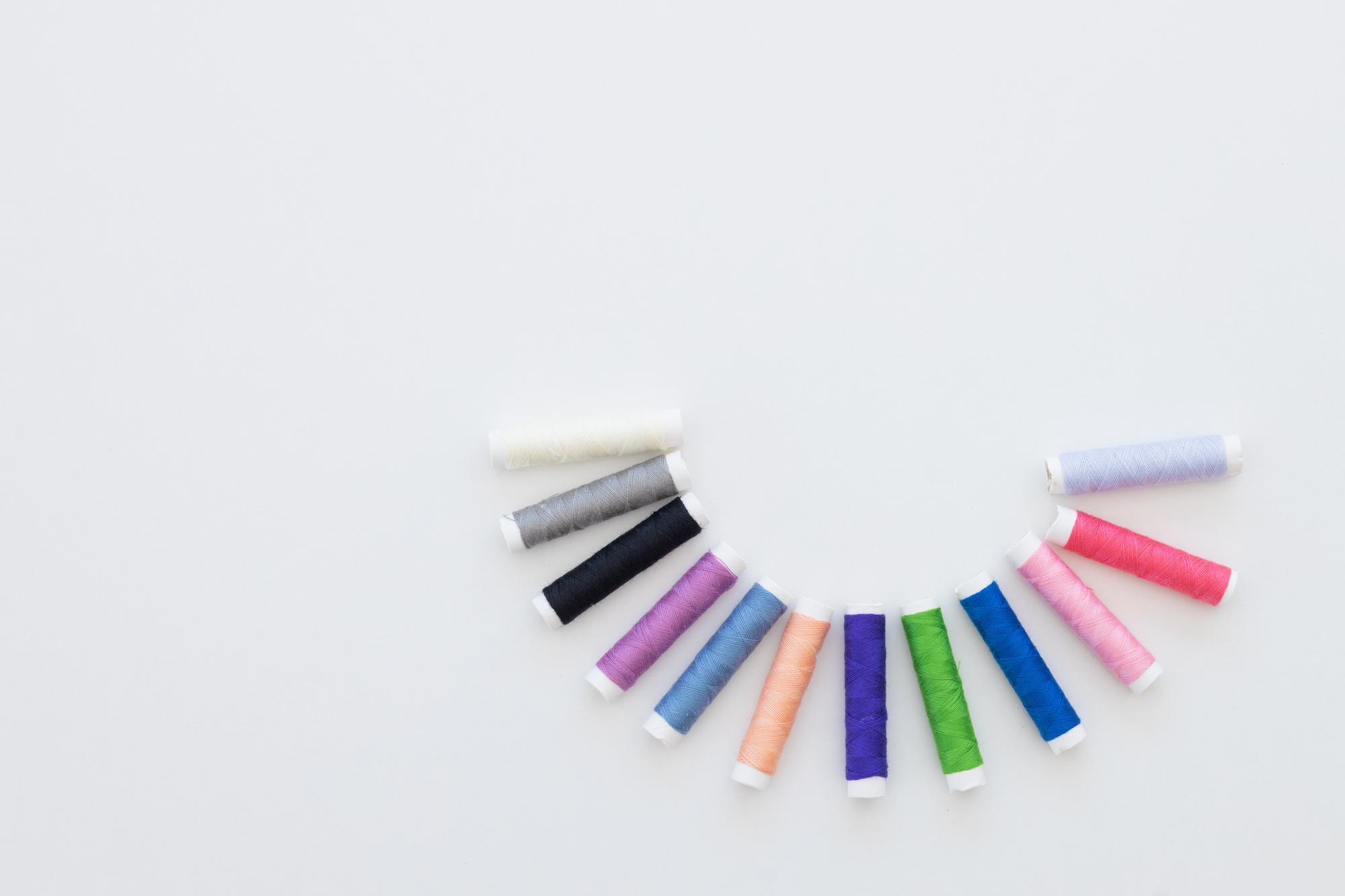 Compact visual of embroidery samples and color swatches